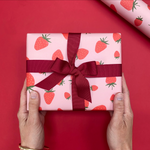 pink and red wrapping paper strawberry design