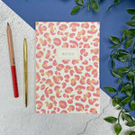 pink animal print notebook