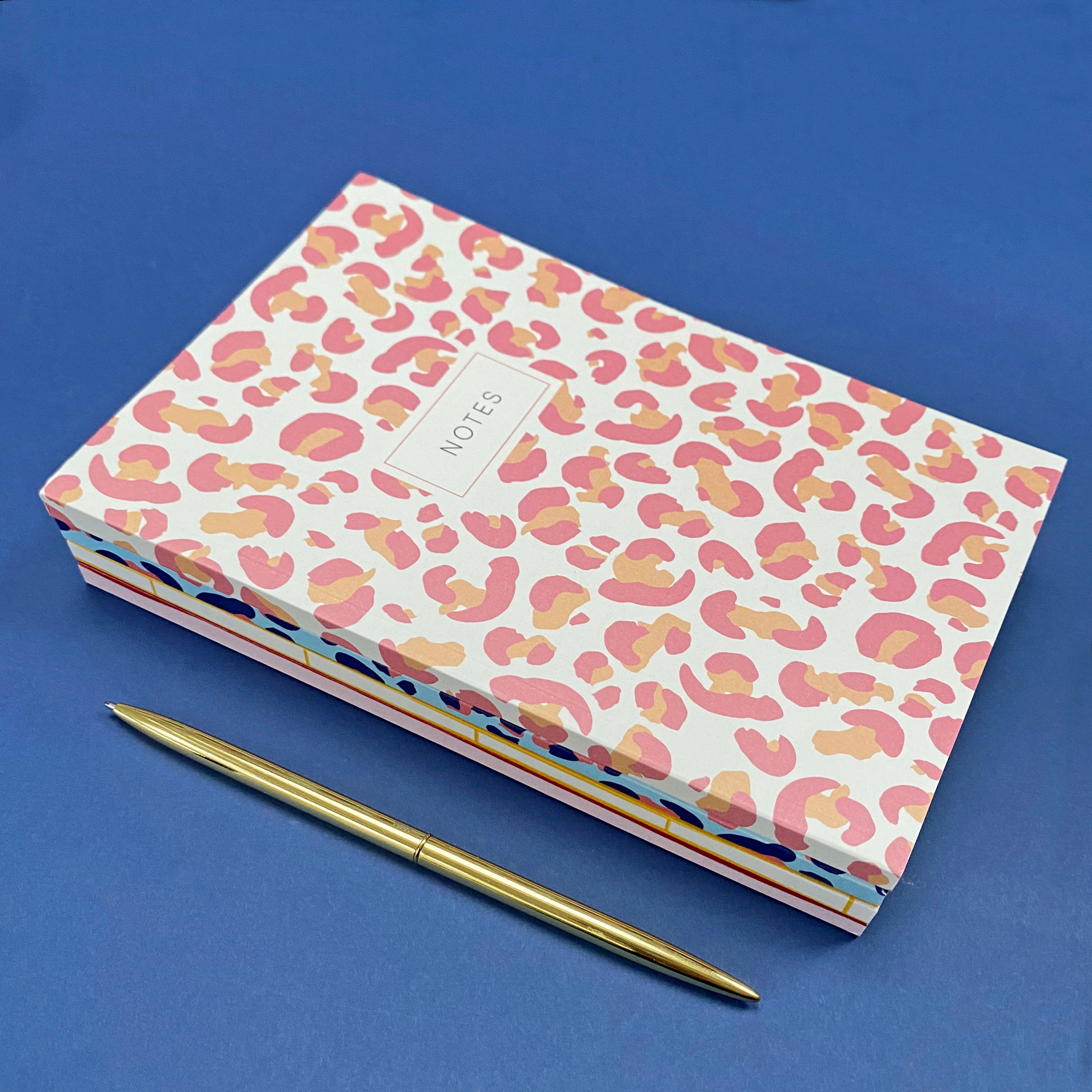 stack of notebooks, leopard print