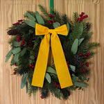 Yellow velvet bow for wreath