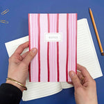 red and pink notebook