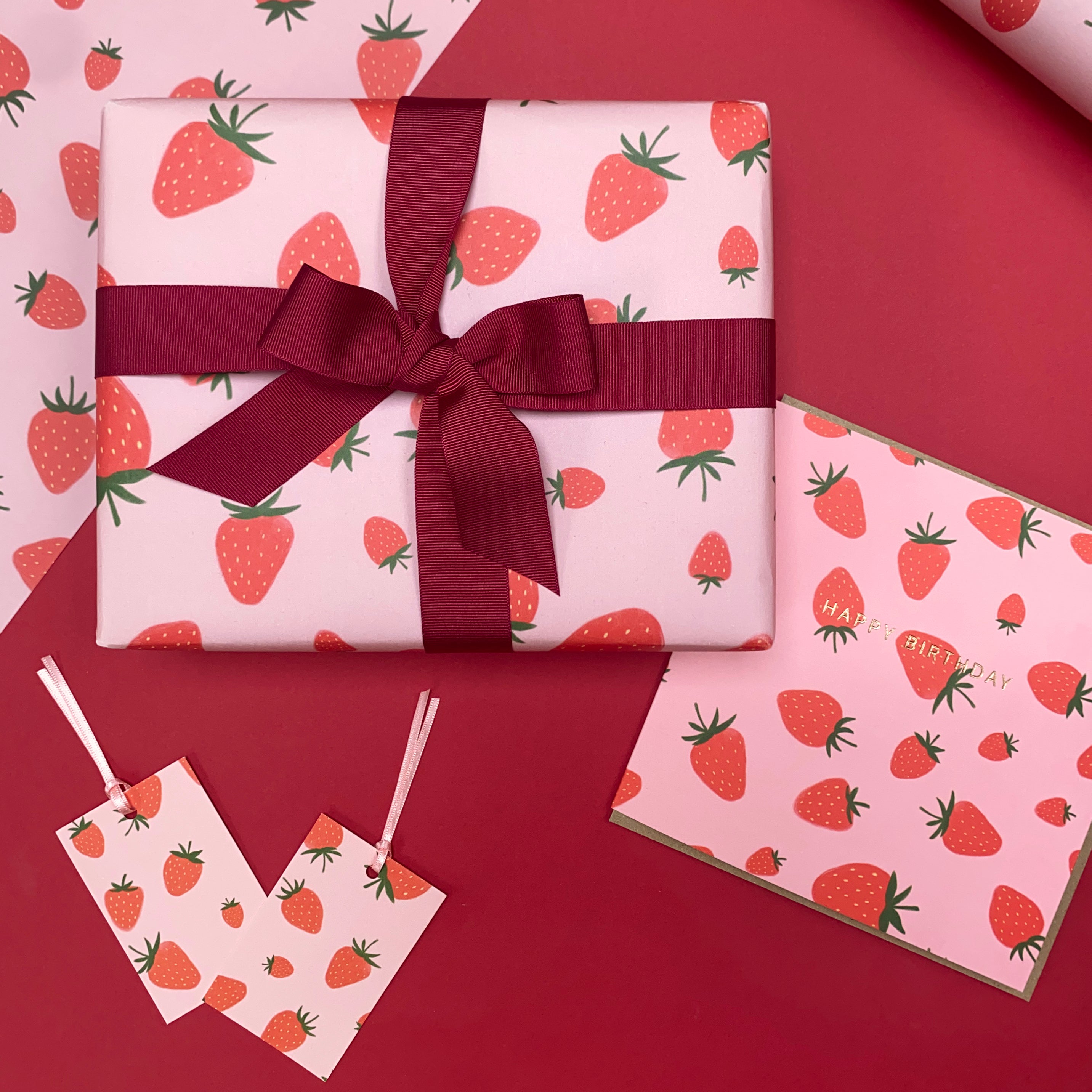 strawberry birthday card with matching strawberry gift wrap and strawberry gift tags