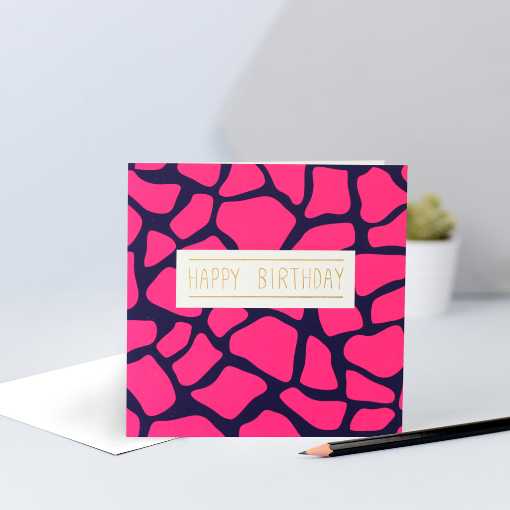 A hot pink and navy giraffe print birthday card.