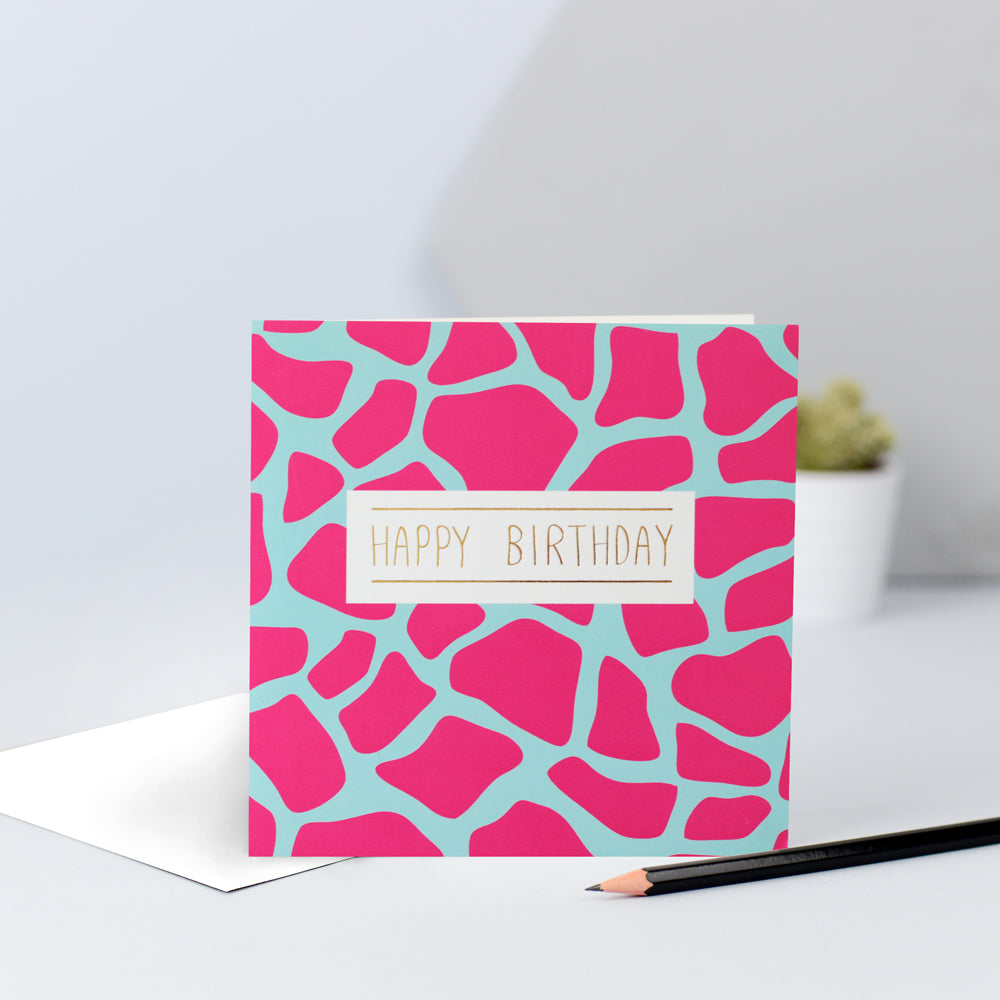 A pink and blue giraffe print birthday card