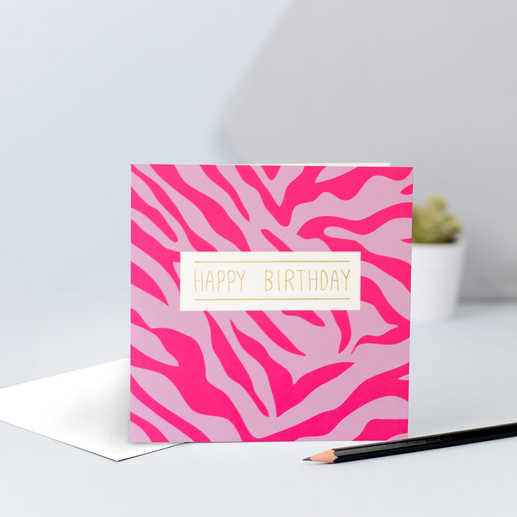 A pink zebra print birthday card.
