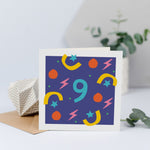 A unisex 9th birthday card with bright colours and shapes