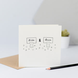 A sweet design with a hand drawn illustration of two champagne corks with the place names for the Bride and Groom stuck in them and surrounded by confetti.