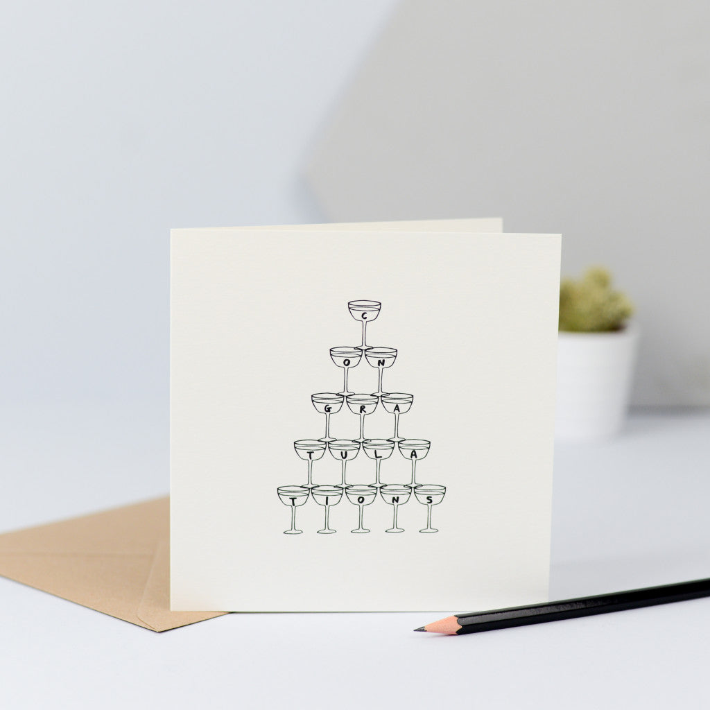 A congratulations card with an illustration of a vintage champagne glass stack.
