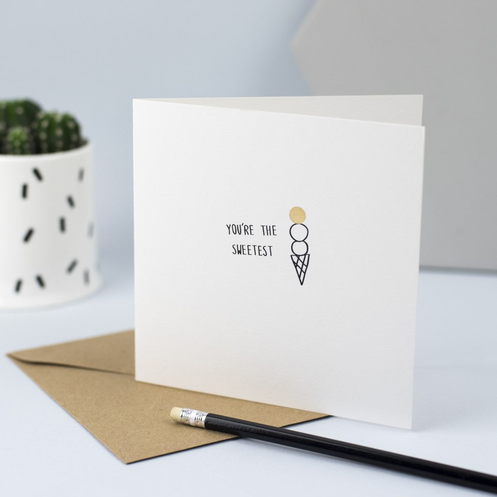 Hand drawn illustration of an ice cream with gold foil and the words "You're the sweetest"