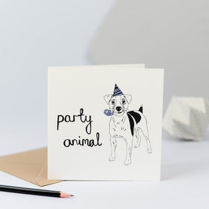 A delightful birthday card with an illustration of a dog in a party outfit.