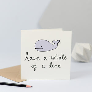 An illustration of a whale with the words "Have a whale of a time". 