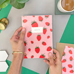 fruity notebook with strawberries
