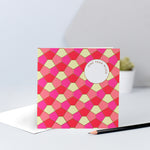A pink, yellow, red and peach tessellating birthday card