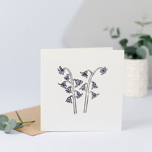A lovely image of some bluebells, originally hand carved into rubber and hand printed and finished with purple on the bluebells.