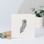 A simple design with a peacock feather, perfect for sending for any occasion.